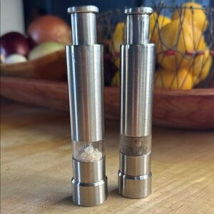 Vintage  Crate&Barrel salt and pepper grinders. 5” tall. Heavy & well made EUC